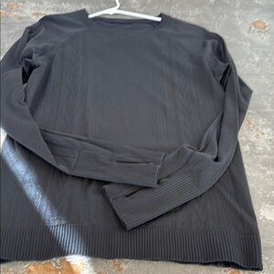 Lululemon long sleeve black ladies shirt. Size 10